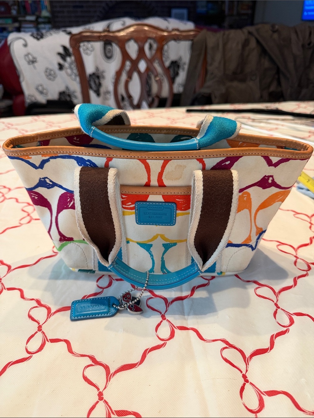 Coach Multicolor Canvas Tote with Teal leather Handles and Brown leather Straps